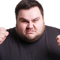 Fototapeta premium Angry man fighting with clenched fists, isolated