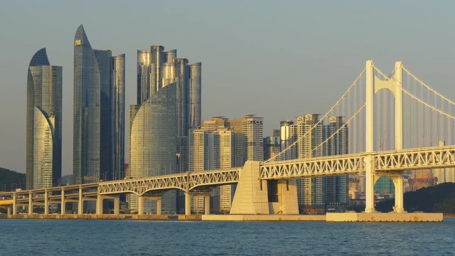 View to Gwangan Bridge in Busan City , South Korea in sunset lights