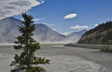 dust storm at the dry kluane lake in yukon territory