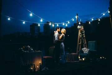 Amazing wedding couple near the river at night