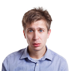 Sad disappointed man looking to camera isolated on white background