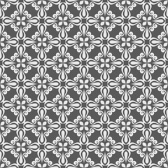 Seamless white and grey floral vector background.