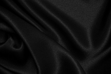 Obraz premium Black silk fabric background