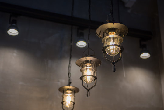 group of hanging lights in coffee shop