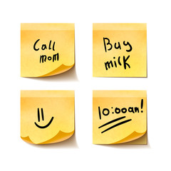 Set of yellow realistic sticky notes with simple short messages on white