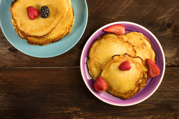 Freshly baked homemade pancakes with fresh fruit