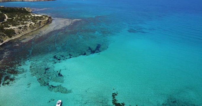 Landscape of a transparent clear blue Mediterranean Sea. The island of Cyprus. Resort. blue lagoon Yacht