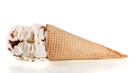 Ice cream cone with caramel isolated on white background