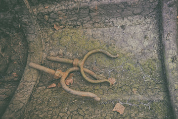 Old oarlocks on the bottom of the boat