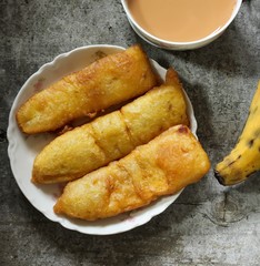Banana fritters / Pazham pori - Popular Kerala deep fried snack with ripe plantains