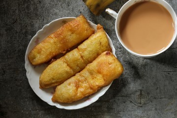 Banana fritters / Pazham pori - Popular Kerala deep fried snack with ripe plantains