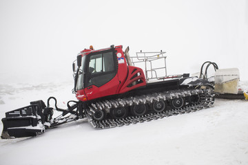 Snowcat in storm.