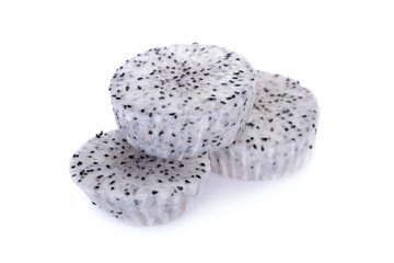 peeled and cut fresh dragon fruit on white background