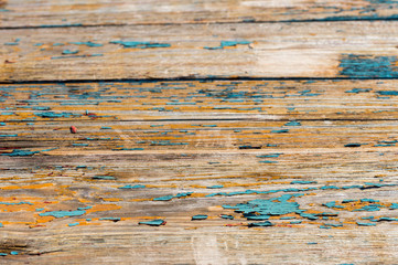 Fototapeta premium Peeling paint from a wooden table