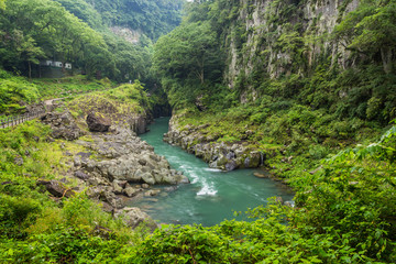 Naklejka na ściany i meble Takachiho gorge landscape and river in Miyazaki, Kyushu, Japan