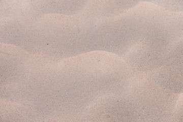 Fototapeta na wymiar Beach closeup sand texture background