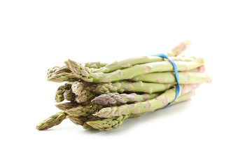 Heap of green asparagus isolated on a white background