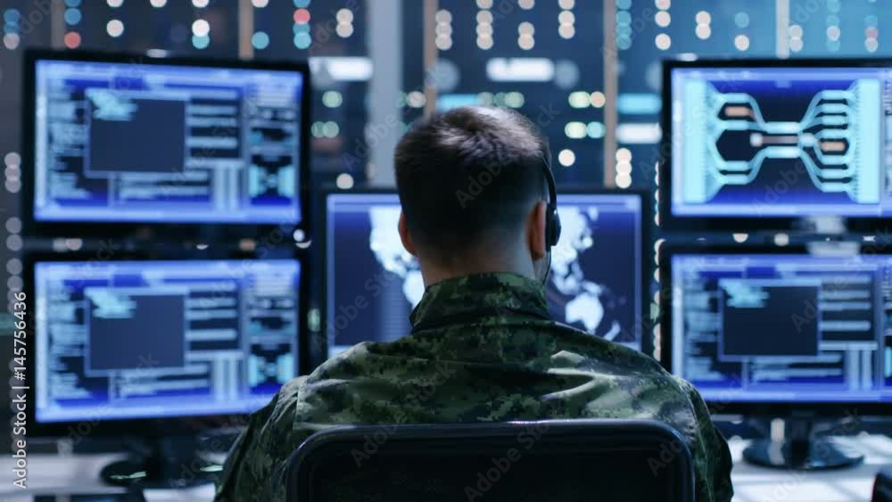 Poster back view of military technical support professional giving instructions using headset. he's works i