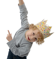 blond little boy with a crown on his head, on white