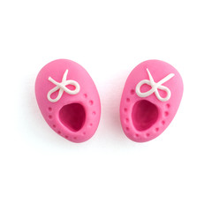 3d handmade pink baby boots plasticine isolated on white background. Cute cartoon figures handicraft for clay plastiline