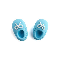 3d handmade blue baby boots plasticine isolated on white background. Cute cartoon figures handicraft for clay plastiline