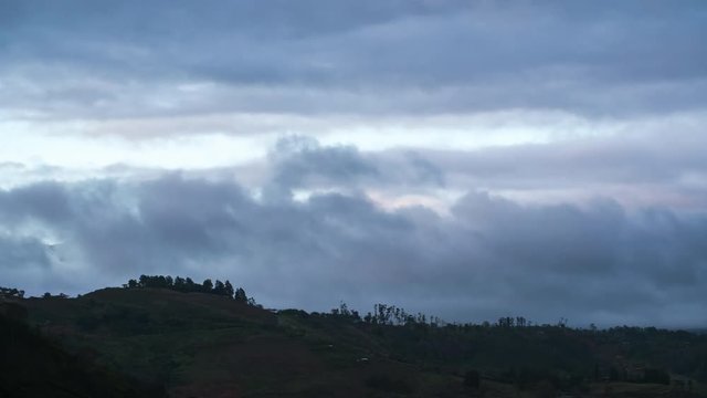 Time lapse of volcano of Irazu partially hidden in clouds during sunset. Costa Rica