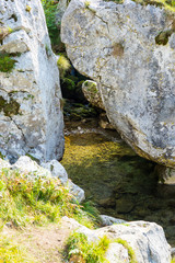 The Rio Bulnes leads along the Canal del Texu, a trackway between the village Bulnes and Poncebos at the river Rio Cares in the Picos de Europa