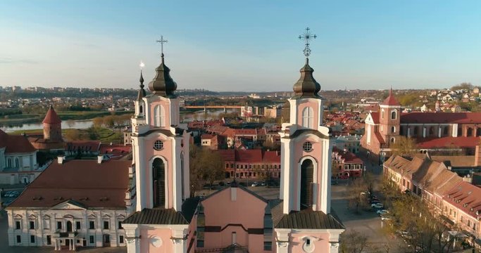 Aerial, Smooth drone shot around Church of St. Francis Xavier and Town Hall above square in Kaunas downtown, Kaunas, Lithuania 