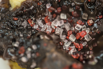 Close up of sugar crystals on a chocolate covered pastry  - 145763833