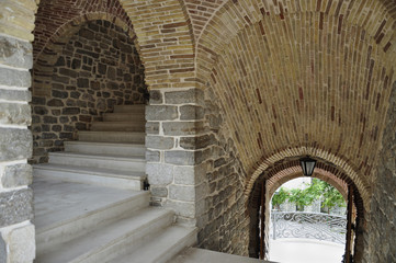 Fototapeta na wymiar View of the entrance and staircase in the fortress of Budva