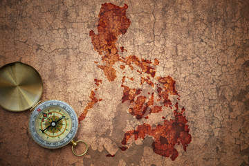 Fototapeta na wymiar map of philippines on a old vintage crack paper