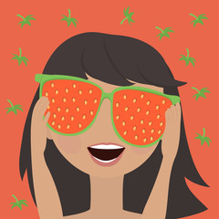 Funny little girl in adult mirrored sunglasses with the reflection of the strawberries on a bright red background. Close-up, portrait