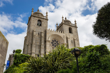 Fototapeta na wymiar Low Angle View of the Sé do Porto (Porto Cathedral), Portugal, against blue sky