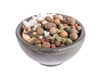 Group of Dry Spices with Thyme and Black Pepper in Black Bowl