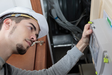 lineman checking the panel