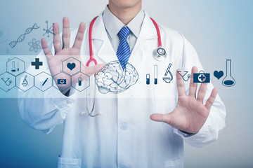 Medicine doctor hand holding stethoscope and working with modern medical icons