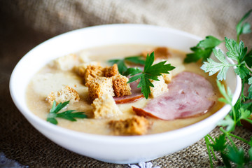 Vegetable soup puree with cheese, bacon