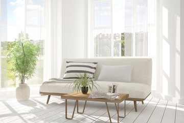 White room with sofa and green landscape in window. Scandinavian interior design. 3D illustration