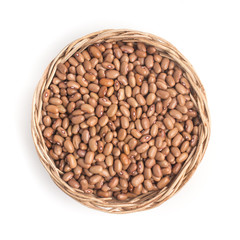 Brown Mulatinho Beans into a basket