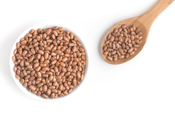 Brown Mulatinho Beans into a bowl