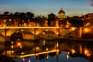 Fototapeta premium Night view on Tiber river and Saint Peter's Basilica in Vatican, Rome, Italy