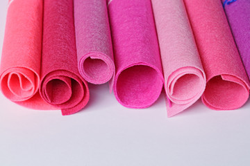 Felt in rolls  on a light background. set for creativity and needlework