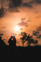 Couple at sunset is beautiful