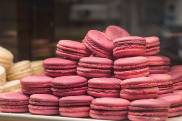 Many pink macaroons or macarons