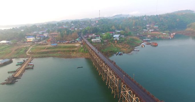 aerial view the wooden bridge connects the hill tribe village with Indigenous villages.the bridge use for walk only. locate in Sangkhlaburi Kanchanaburi Thailand