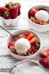 Breakfast bowls with frozen banana, raspberries, cocoa powder, nuts and coconut
