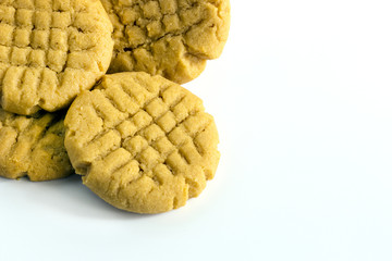 Homemade peanut butter cookies on white background