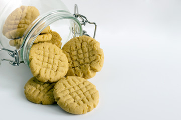 Homemade peanut butter cookies on white background