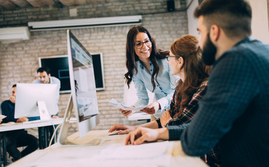 Corporate teamworking colleagues in modern office