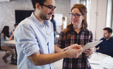 Company coworkers working in office